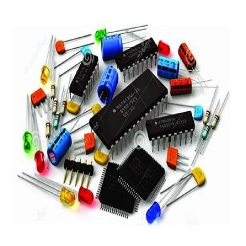 Assorted electronic components including resistors, capacitors, and IC chips for industrial vacuum systems.