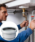 Plumber installs Must Have 12 Pack Silicone Sink Drain Gasket Set With Slip Joint Washers And Seal Rings For One And A Half Inch Drain Pipes Durable Kitchen And Outdoor Plumbing Seals Includes Transparent Storage Box For Easy Organization under sink.