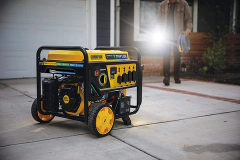 Tri Fuel 12,500-Watt Electric Start Portable Generator With CO Shield in driveway, runs on natural gas, propane, or gasoline