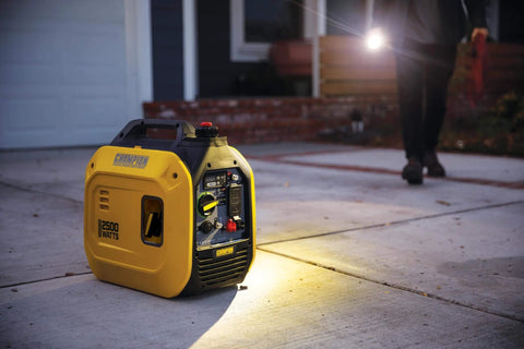 Ultralight 2500-Watt Portable Inverter Generator with Quiet Technology on a driveway, perfect for home backup and camping.