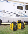 Ultralight 2500-Watt Portable Inverter Generator With Quiet Technology And CO Shield beside RV on grass