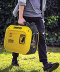 Person carrying Ultralight 2500-Watt Portable Inverter Generator With Quiet Technology And CO Shield for camping, tailgating, home backup