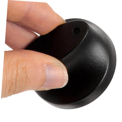Hand holding a black plastic rotary Universal Timer Knobs Replacement For Ovens Sterilizers And Rice Cookers.