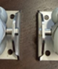 Two 2550-111WU 90mm Polyurethane Omni Wheels with aluminum frame, 8mm bore, designed for smooth movement in robotic carts.