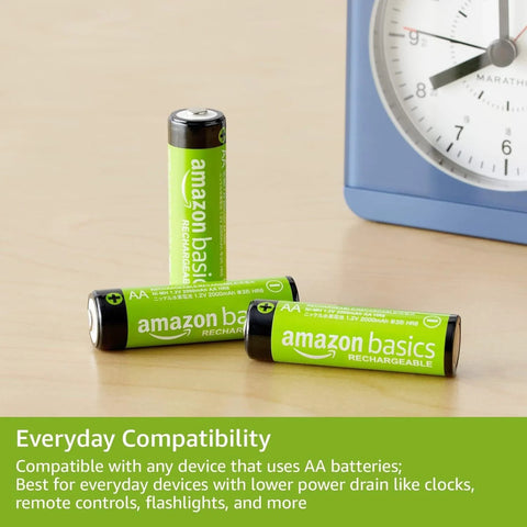 AA Rechargeable NiMH Batteries 2000 mAh Low Self Discharge 1000 Recharges 8 Pack with clock in background