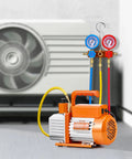 All-in-One AC Vacuum Pump And Gauge Kit With Leak Detector Hoses For Auto And HVAC Service by VEVOR, shown with AC unit in background.