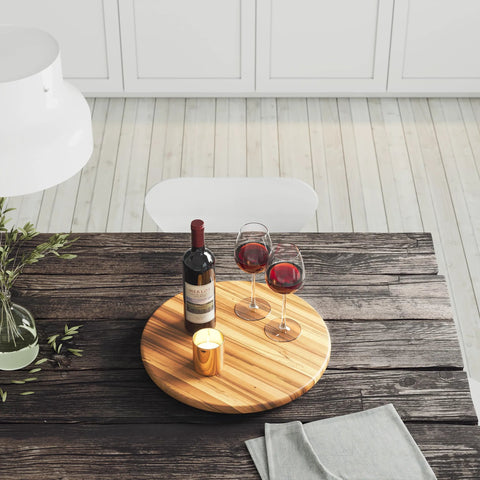 18 Inch Lazy Susan Kitchen Turntable in Acacia Wood for spices, condiments, on rustic table with wine, glasses, and candle.