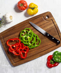 Acacia Wood Cutting Board With Juice Groove For Everyday Kitchen Prep Kitchen Workhorse 15 Inch By 10 Inch Durable Carving Board For Meat And Veggies Easy Juice Containment Great For Serving TB Home with sliced peppers and knife