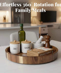 12 inch acacia wood lazy susan wooden turntable organizer with condiments and snacks on a kitchen table.