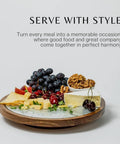 Close-up of 12 inch acacia wood lazy susan turntable with removable glass plate, featuring assorted cheeses and fruits.