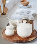 Two Pack 10 Inch Acacia Wood Lazy Susan Turntables For Cabinet Kitchen Countertop And Pantry Organization with jars and bowls