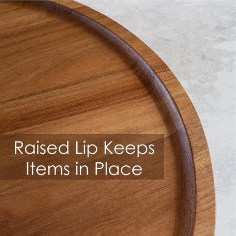 Close-up of Acacia wood lazy susan organizer designed for kitchen and pantry use, featuring a raised lip for stability.