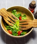 Acacia Wood Salad Hands For Tossing And Serving Non Slip Grip Kitchen Utensils For Salad Greens And Pasta Easy Toss And Plating At Table Durable Handheld Serving Tools For Home Cooks in bowl with salad