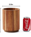 Acacia Wood Utensil Holder For Kitchen Countertop With 360 Degree Rotating Base shown beside soda can for size comparison.