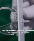 Golf Ball Wall Mount Display For Single Balls With Transparent Acrylic Claw Design and screw installation close-up