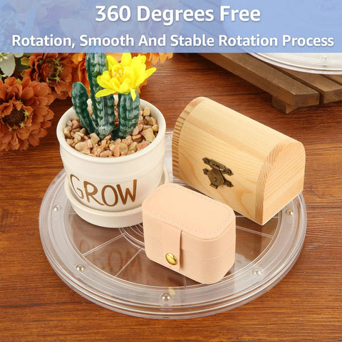 Four 8 Inch Acrylic Lazy Susan Turntable with Ball Bearing Rotation 360 Degree Spinning Tray on wooden table, cactus plant, wooden chest.