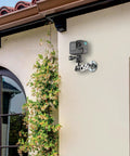 Universal Wall Mount Bracket with Adjustable Metal Arm installed outdoors with action camera, heavy duty dual ball head for stable mounting