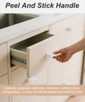 8 Pack Adhesive Cabinet Handles Peel and Stick Drawer Pulls White No Drill installed on kitchen drawer