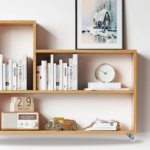 Bookshelf with books, clock, and decor mounted on self adhesive caster wheel set four pack heavy duty swivel casters with 360 degree rotation for carts furniture and storage boxes 50mm by 40mm easy install adhesive mount.