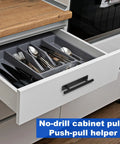Open kitchen drawer with Self Stick Push Pull Drawer Pulls Adhesive Handles for cabinets, featuring black peel-and-stick handle.