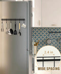 Kitchen Utensil Hanger, Adhesive Utensil Holder Wall Mount Kitchen Rack Rail with 12 Hooks, black, installed on a fridge with utensils