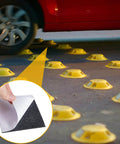 20 Pcs Adhesive Pads For Road Reflectors shown with yellow road markers on asphalt, close-up of black adhesive pad in use