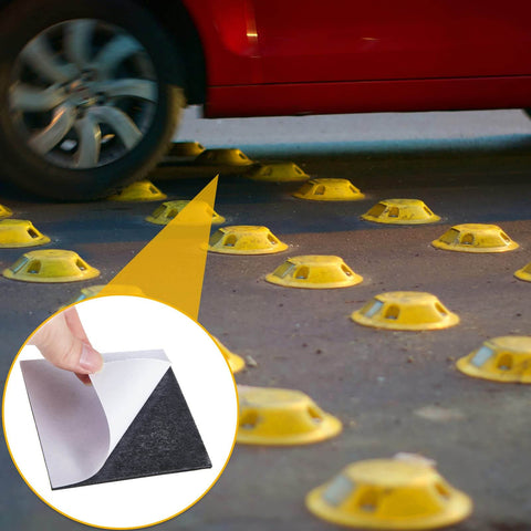 20 Pcs Adhesive Pads For Road Reflectors shown with yellow road markers on asphalt, close-up of black adhesive pad in use