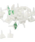 Sticky PCB Spacer Kit With 24 Adhesive Standoffs 0.37 Inch Height Insulated White Mounts scattered on surface