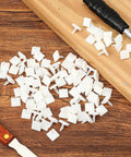 Sticky PCB Spacers 100Pcs Adhesive Insulated Standoffs For PC Boards And Computer Motherboards 0.25 Inch Height on table