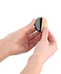 Person holding One Inch Hemisphere Rubber Bumpers With Adhesive Backing For Vibration Isolation And Shock Dampening, 8 Pack.