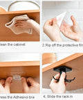 Steps to install 2pcs Under Cabinet Kitchen Utensil Rack,360° Rotating Under Shelf Kitchen Utility Hooks, showing adhesive application.