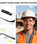 Anti Fog Safety Glasses With Clear Wraparound Lenses, adjustable temples shown, worn by worker at construction site for protection from dust.