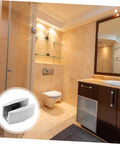 Experience a quiet, draft free doorway with an adjustable stainless steel swing stopper and glass fixing locator in a bathroom setting.