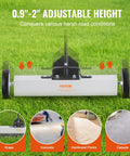 Effortless, heavy duty rolling magnetic sweeper with a 24 inch wide magnet and 50 lb pickup capacity on grass surface