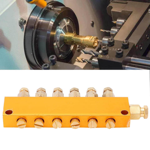 Five To Six Way Adjustable Oil Distributor Manifold For Automatic Lubrication Pumps in use on a CNC machine, brass material.