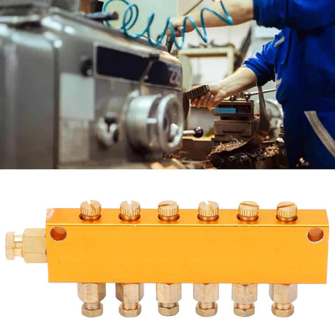 Five To Six Way Adjustable Oil Distributor Manifold For Automatic Lubrication Pumps, brass block with six outlets, in workshop setting