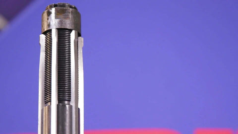 Close-up of an Adjustable Reamer In High Speed Steel 1-1/2 To 1-13/16 Inch Capacity With Black Oxide Finish for precision machining.