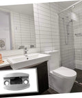Experience a quiet, draft free doorway with an adjustable stainless steel swing stopper and glass fixing locator in bathroom