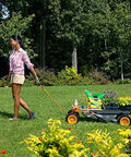 Person maneuvering 8 in 1 Heavy Duty Aerocart Garden Cart Wheelbarrow Dolly with Turbo Lift Design and Flat Free Tires on grass