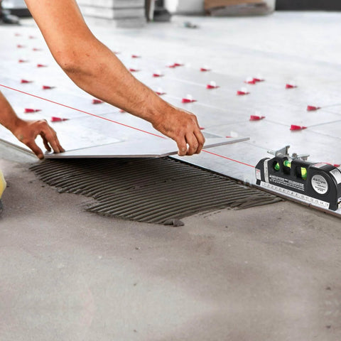 Person using Laser Level Line Tool, Multipurpose Laser Level Kit Standard Cross Line Laser leveler Beam Tool with Metric Rulers for tiling