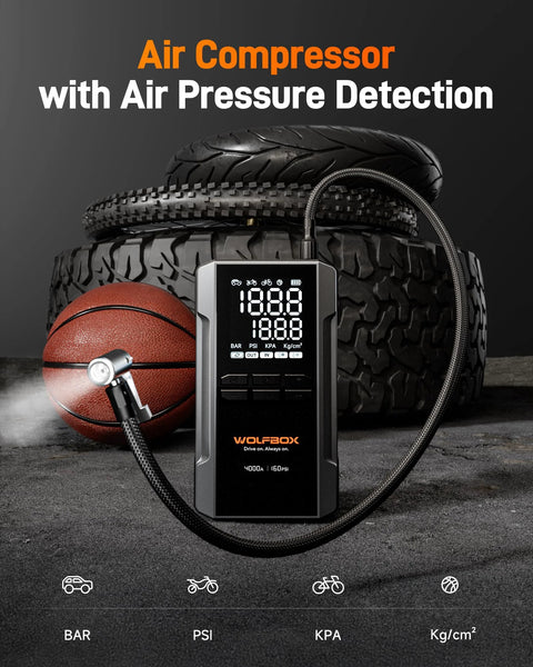 4000A Jump Starter With 160 PSI Air Compressor, 88.8Wh Battery Pack displaying LED pressure monitor with tire in background