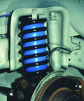 Coil Rite Air Helper Spring Kit For Open Coil Suspension installed in vehicle showing durable polyurethane springs