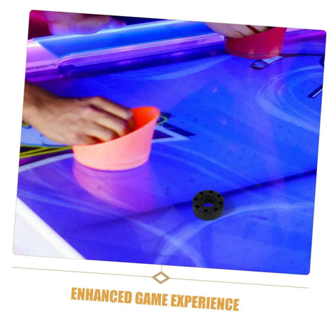 16 Pack Foosball Rubber Bumpers And Rod Protectors For Standard Tables on illuminated foosball table surface with orange paddles.