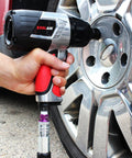 Using 44 Piece Pro Grade Air Tool Accessory Kit With Heavy Duty Impact Wrench Air Ratchet Die Grinder Blow Gun Air Hammer Dual Air Chuck Tire Gauge And Essential Accessories For Home Garage And Auto Shop to secure a car wheel