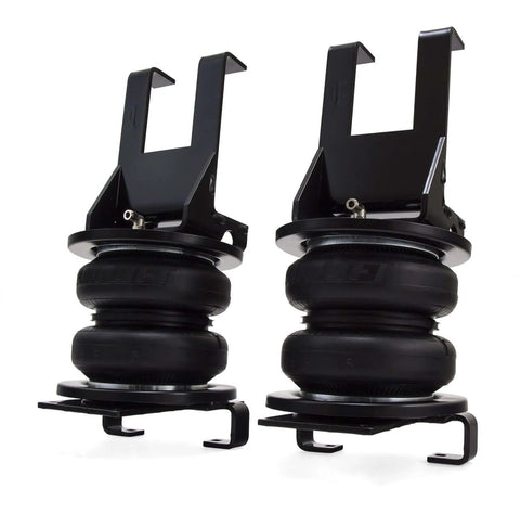 Premium air spring kit delivers up to 7500 lbs leveling, adjustable 5 to 100 psi, shown as two black air springs.