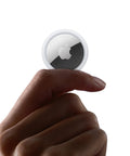 Apple AirTag 2nd Generation Tracker for Keys and Wallets with Sound Locator, Easy One Tap Setup held between fingers