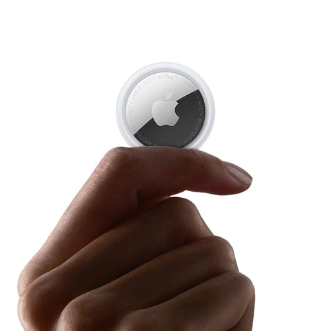 Apple AirTag 2nd Generation Tracker for Keys and Wallets with Sound Locator, Easy One Tap Setup held between fingers