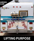 Back of a touring car with 'Alaska or Bust' sign, metal tank, and a mounted air conditioning unit.