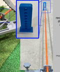 Leveling And Alignment Stand For Launch Monitors Compatible With MLM2Pro And Garmin R10 Mounting Accessory With Ryobi ELL1501 For Precise Surface Alignment And Stable Indoor Outdoor Use Superior Durability showing all-metal stand and alignment stick support on grass.