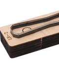 Durable Alloy Steel Leather Cutting Die Set for DIY Leather Craft Projects showing close-up of steel on wood base